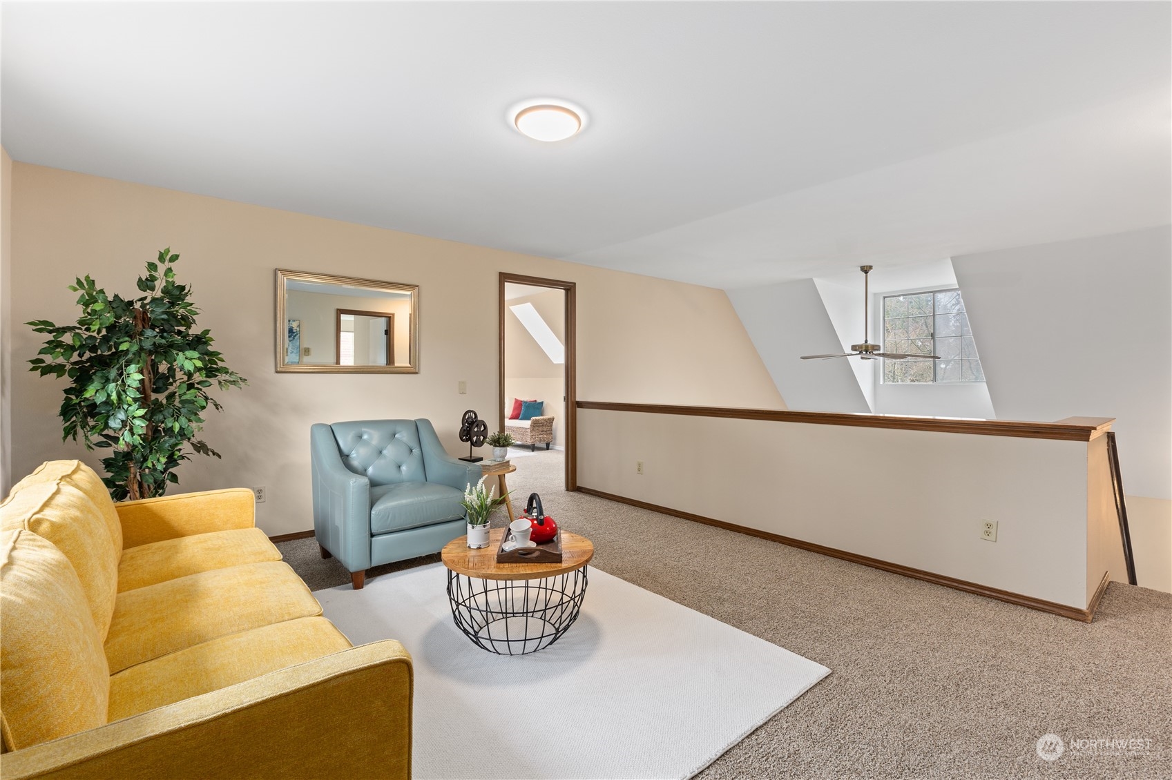 2012 233rd Street Southeast Bothell, WA 98021 - Photo 23 of 39 a living room with furniture and a potted plant