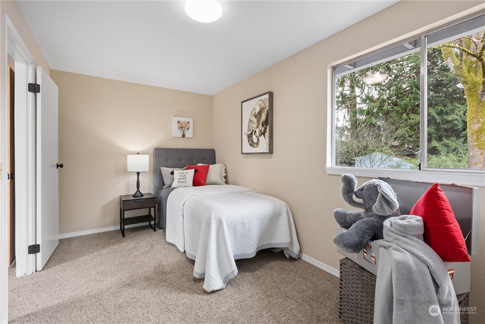 2012 233rd Street Southeast Bothell, WA 98021 - Photo 29 of 39 a bedroom with a bed and a window