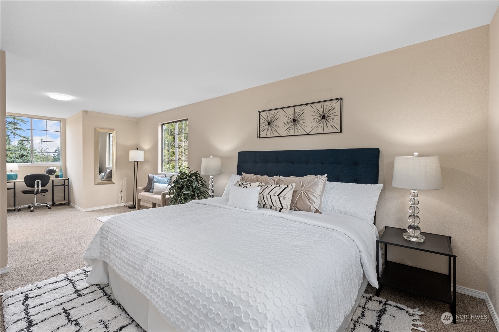 2012 233rd Street Southeast Bothell, WA 98021 - Photo 31 of 39 a bed room with a bed and a lamp