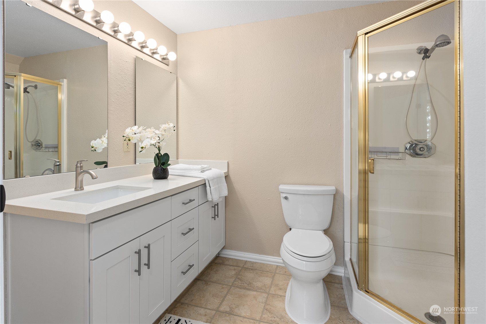 2012 233rd Street Southeast Bothell, WA 98021 - Photo 35 of 39 a bathroom with a toilet sink and mirror