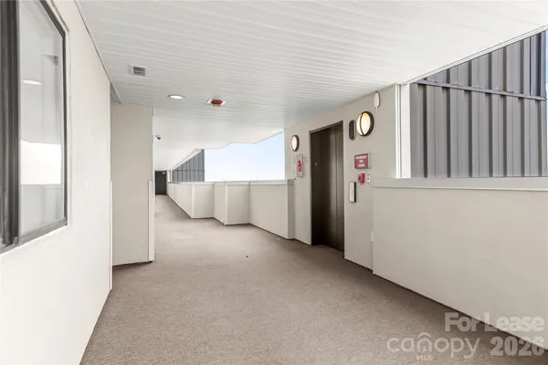 a view of a livingroom with a kitchen