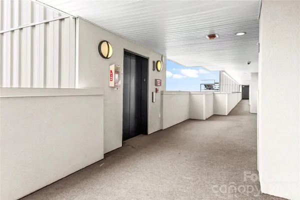 a view of an entryway with a fireplace
