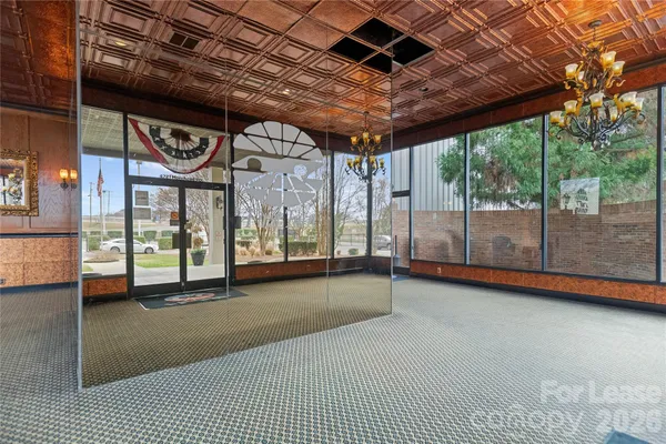 a room with table and chairs