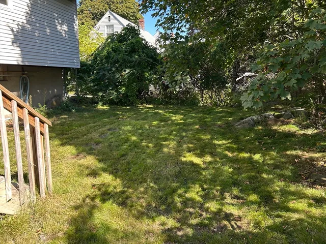 a view of backyard of house