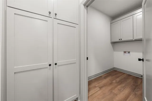 a kitchen with stainless steel appliances a stove a sink and a refrigerator