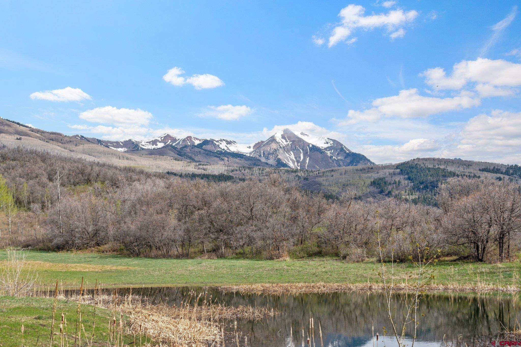 Tbd Tbd Destination Ranch Road Durango, CO 81301 - Photo 16 of 16 a view of a lake with a mountain in the background