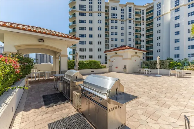a view of a livingroom with furniture and a chandelier