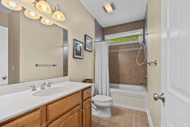 a bedroom with a bed and dresser