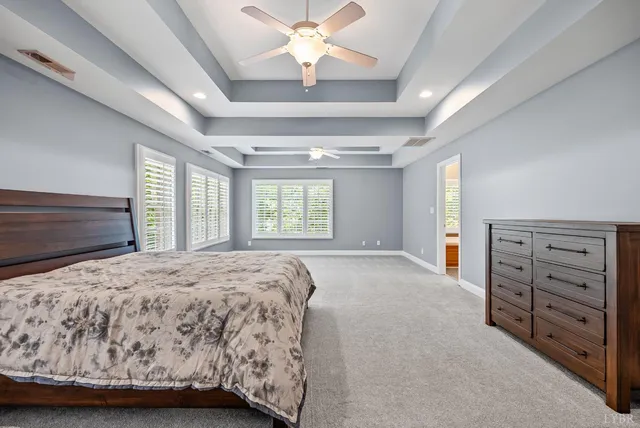 a spacious bathroom with a double vanity sink mirror and