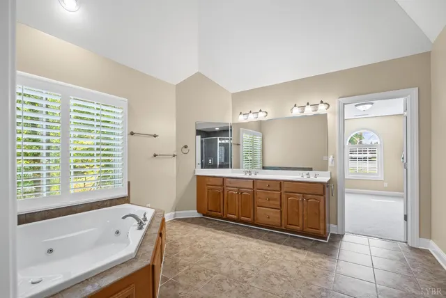 a living room with furniture and a walk in closet