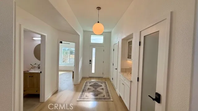 a view of a bathroom with tub shower