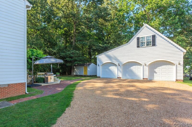 4500 Hemway Road Chester, VA 23831 - Photo 3 of 26 a view of a house with backyard and trees