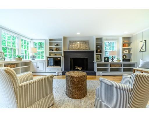 234 Highland Road Andover, MA 01810 - Photo 11 of 29 a living room with furniture and a fireplace