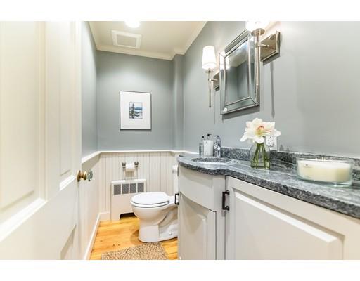 234 Highland Road Andover, MA 01810 - Photo 15 of 29 a bathroom with a granite countertop sink mirror vanity and toilet