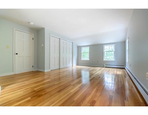 234 Highland Road Andover, MA 01810 - Photo 17 of 29 a view of empty room with window and wooden floor
