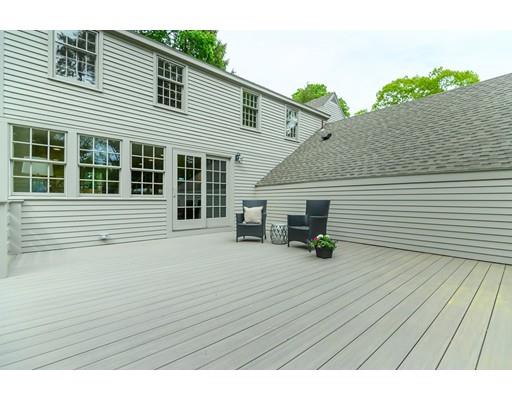 234 Highland Road Andover, MA 01810 - Photo 26 of 29 a view of a deck with wooden floor and fence