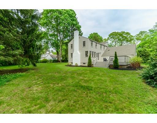 234 Highland Road Andover, MA 01810 - Photo 29 of 29 a view of a backyard with potted plants and large tree
