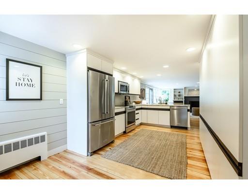 234 Highland Road Andover, MA 01810 - Photo 4 of 29 a kitchen with granite countertop a refrigerator and a sink
