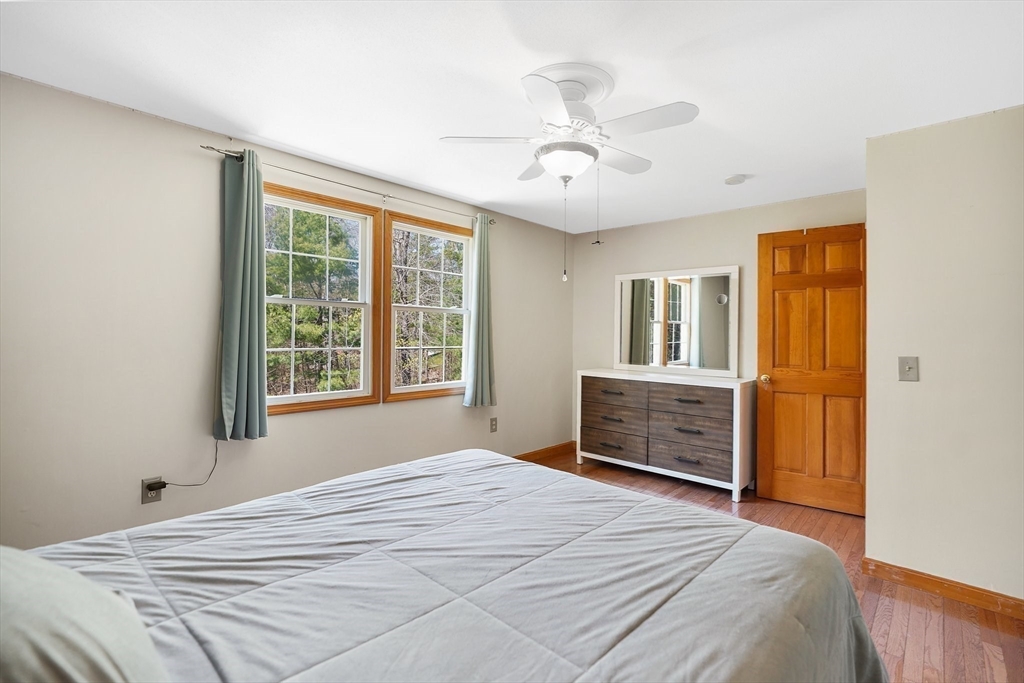 103 Ames Road Hampden, MA 01036 - Photo 23 of 42 a bedroom with a bed and a window