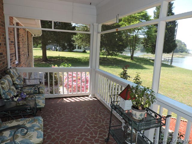 4063 Aberdeen Creek Road Gloucester, VA 23061 - Photo 14 of 31 REAR SCREEN PORCH