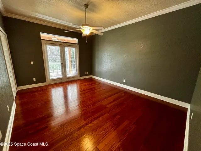 a view of livingroom with window and hardwood floor