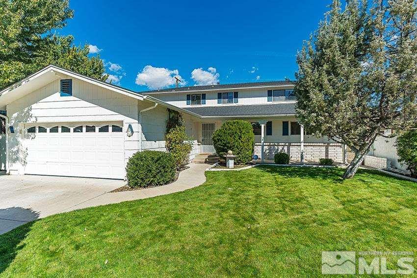 1895 Prince Way Reno, NV 89503 - Photo 1 of 17 a view of a house with a yard potted plants and a large tree