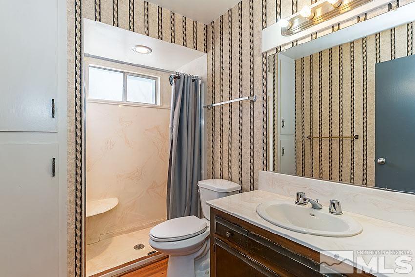 1895 Prince Way Reno, NV 89503 - Photo 11 of 17 a bathroom with a sink toilet and shower