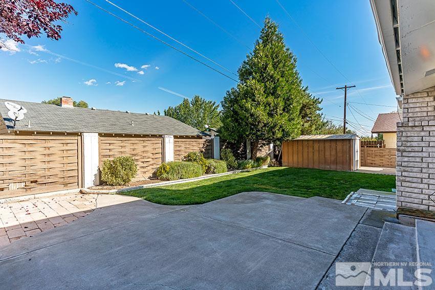 1895 Prince Way Reno, NV 89503 - Photo 17 of 17 a front view of a house with a yard and garage