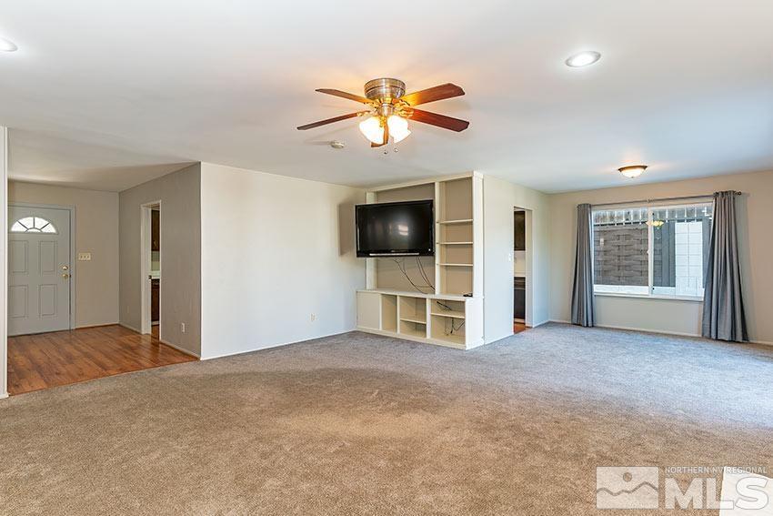 1895 Prince Way Reno, NV 89503 - Photo 2 of 17 a view of a livingroom with a ceiling fan and window