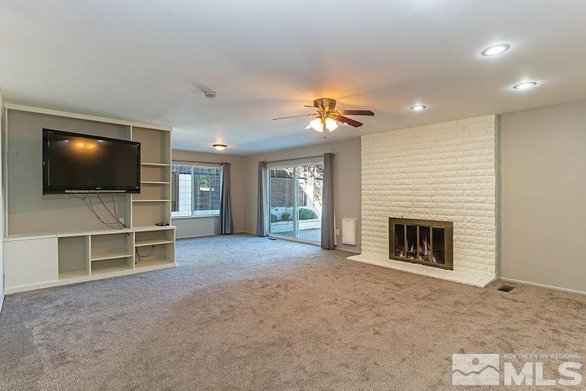 1895 Prince Way Reno, NV 89503 - Photo 3 of 17 a view of a livingroom with an empty space and a fireplace