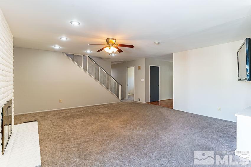 1895 Prince Way Reno, NV 89503 - Photo 4 of 17 a view of a livingroom with a ceiling fan and window