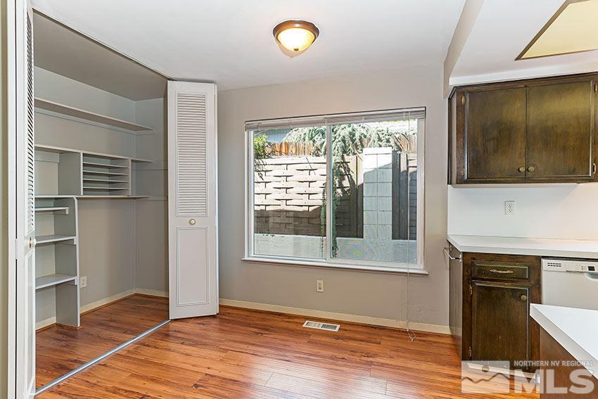 1895 Prince Way Reno, NV 89503 - Photo 5 of 17 a view of an empty room with a window and wooden floor