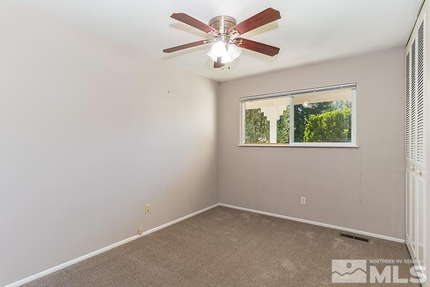1895 Prince Way Reno, NV 89503 - Photo 7 of 17 an empty room with windows and fan
