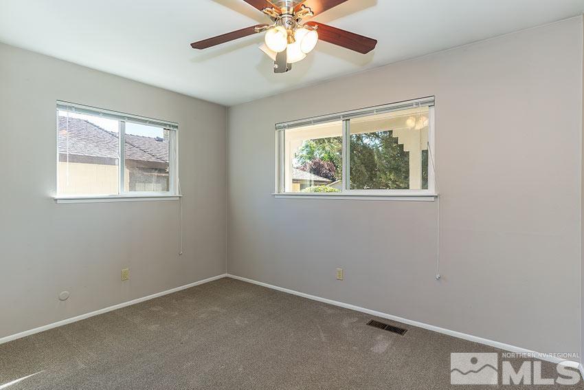 1895 Prince Way Reno, NV 89503 - Photo 8 of 17 an empty room with a window and a fan