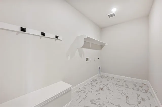 a view of small space with racks on the wall