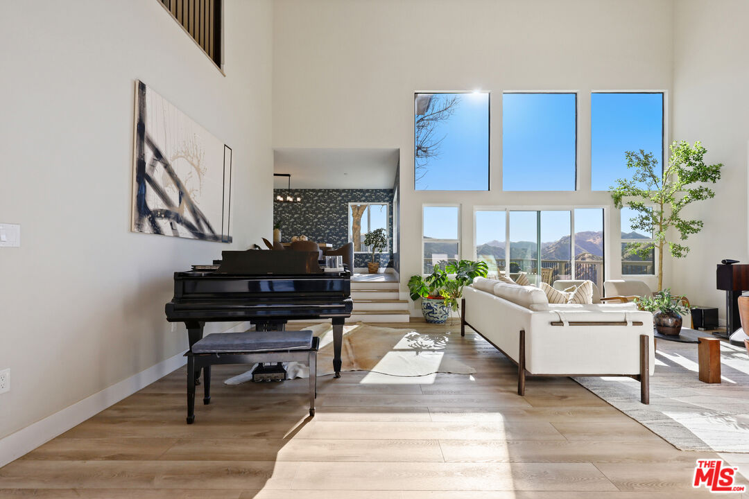 53 Saddlebow Road Bell Canyon, CA 91307 - Photo 6 of 66 a living room with furniture and a piano