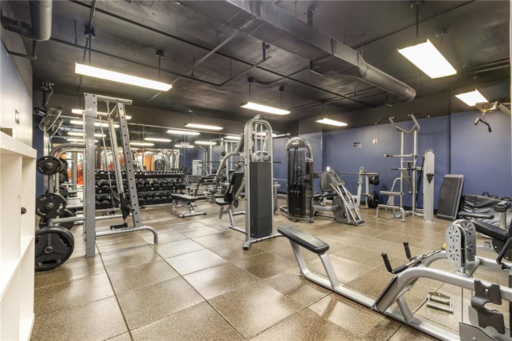 1101 Juniper Street Northeast, Unit 822 Atlanta, GA 30309 - Photo 27 of 37 a view of a room with gym equipment
