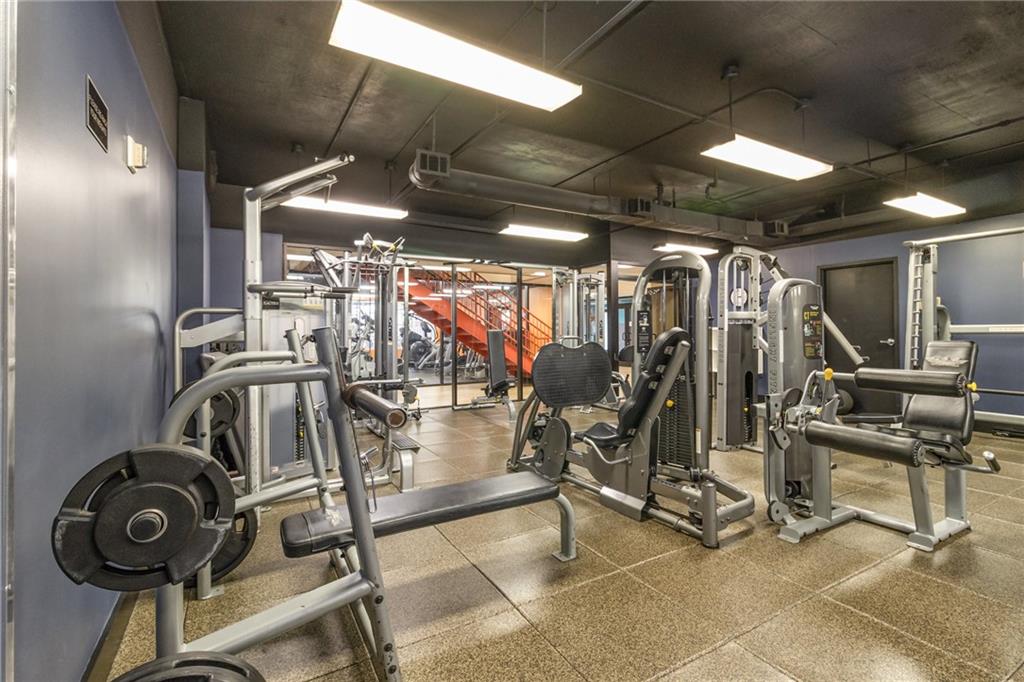 1101 Juniper Street Northeast, Unit 822 Atlanta, GA 30309 - Photo 28 of 37 a view of a room with gym equipment