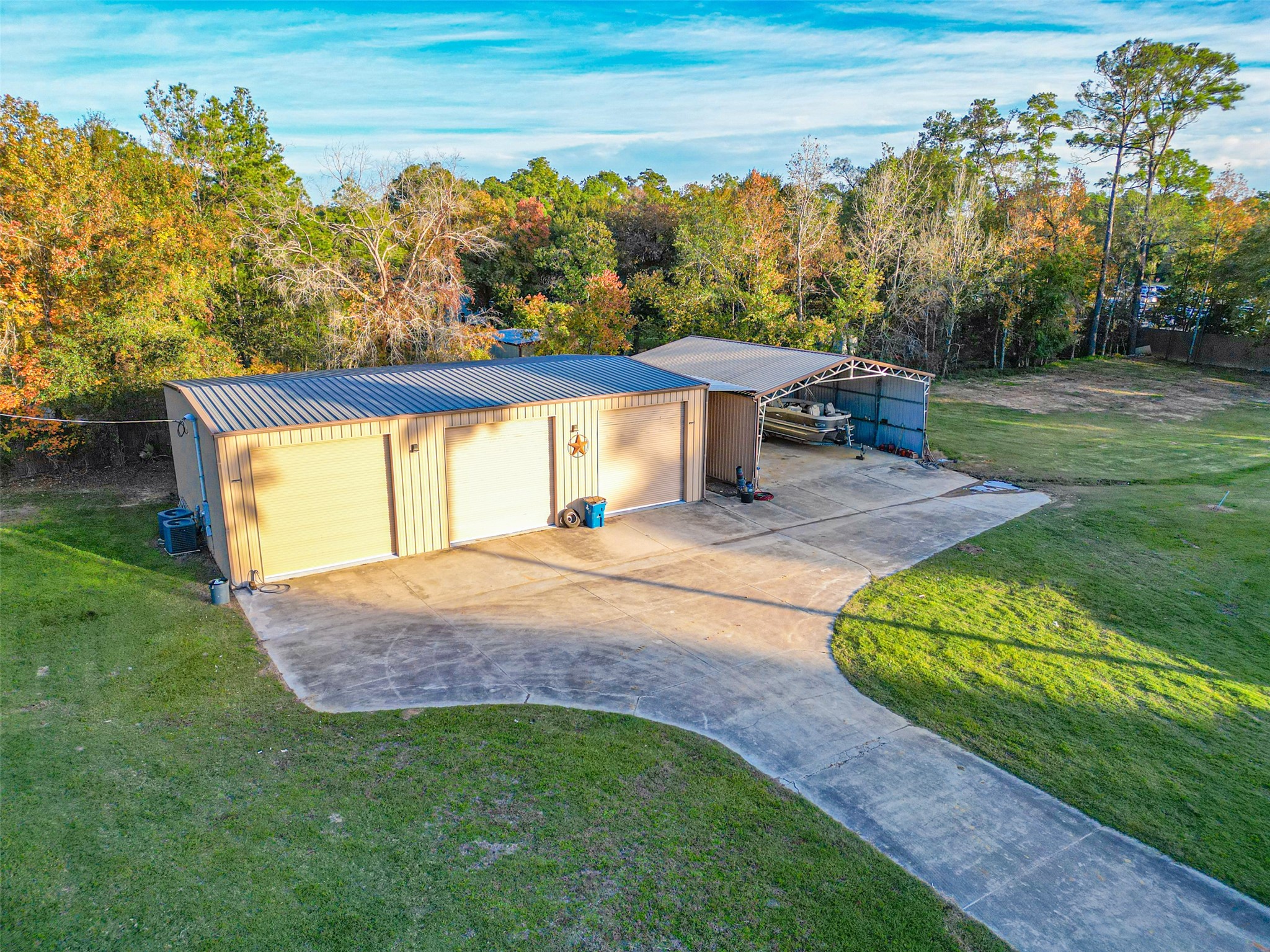2499 Southline Road Conroe, TX 77384 - Photo 46 of 50 a view of a swimming pool with a yard