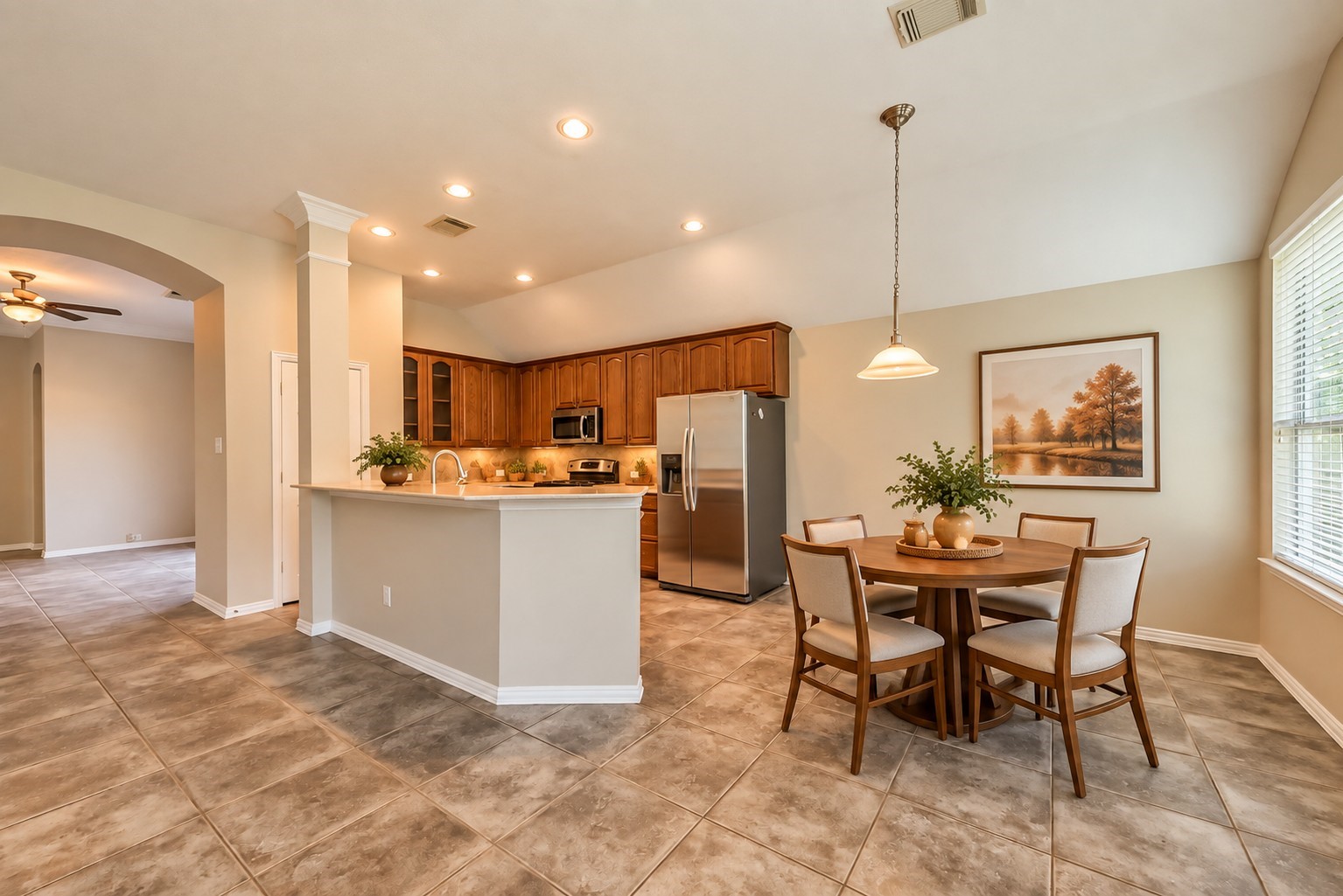 30910 Blue Ridge Park Lane Spring, TX 77386 - Photo 9 of 50 Bright and inviting breakfast room seamlessly blends into the modern kitchen, creating a perfect space for morning gatherings.