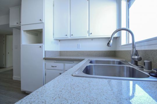 723 West Wilson Avenue Ridgecrest, CA 93555 - Photo 9 of 29 a kitchen with a sink and cabinets