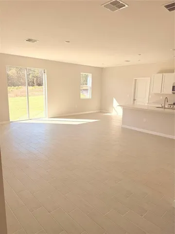 an empty room with cabinet