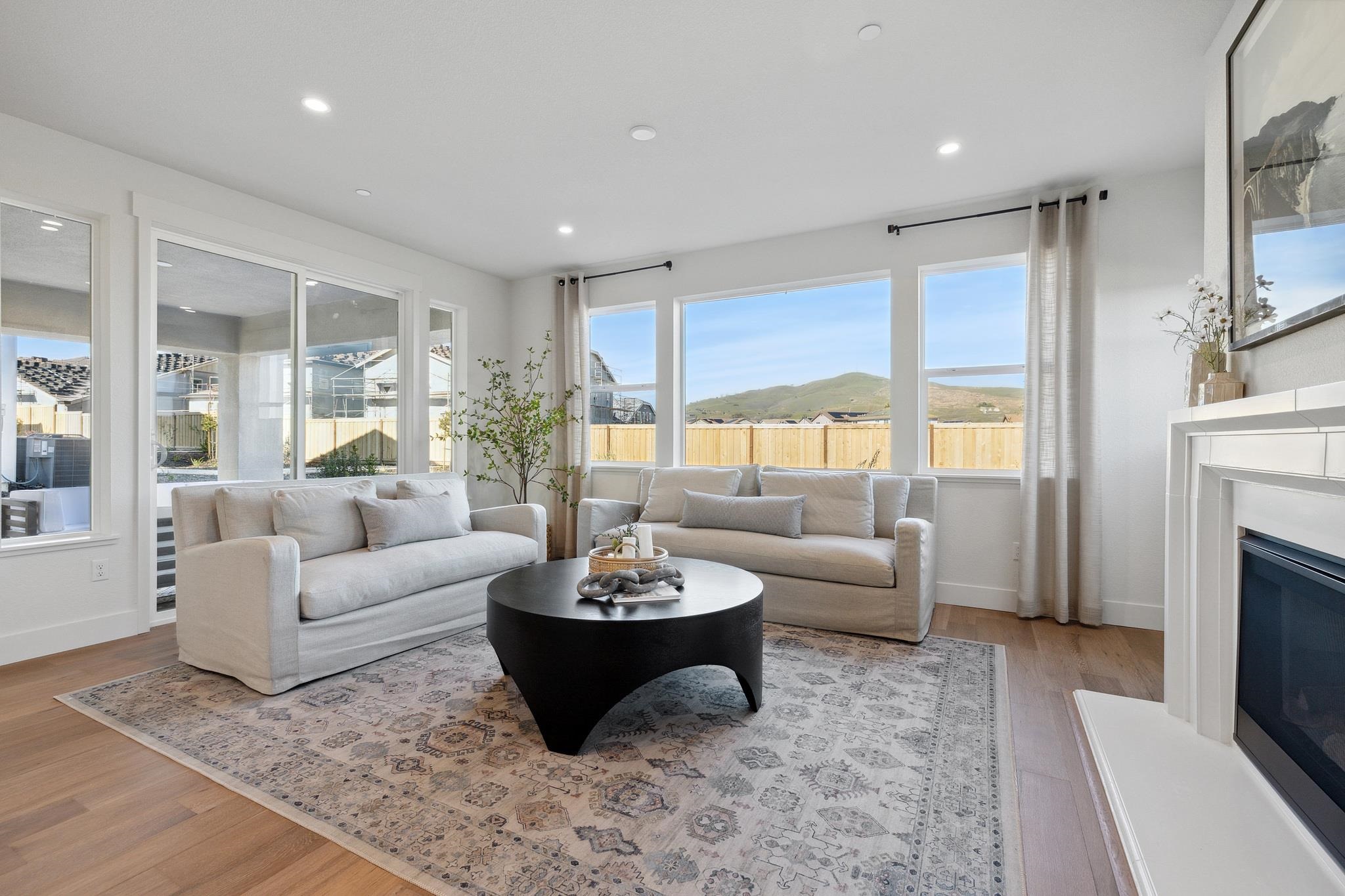 1516 Millennium Way Fairfield, CA 94533 - Photo 15 of 57 a living room with furniture fireplace and a large window