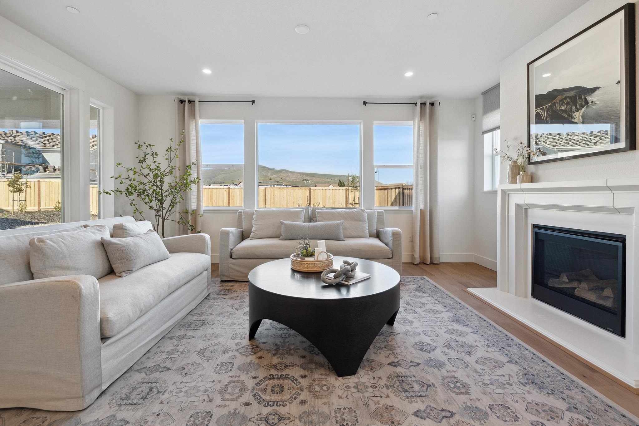 1516 Millennium Way Fairfield, CA 94533 - Photo 21 of 57 a living room with furniture a window and a fireplace