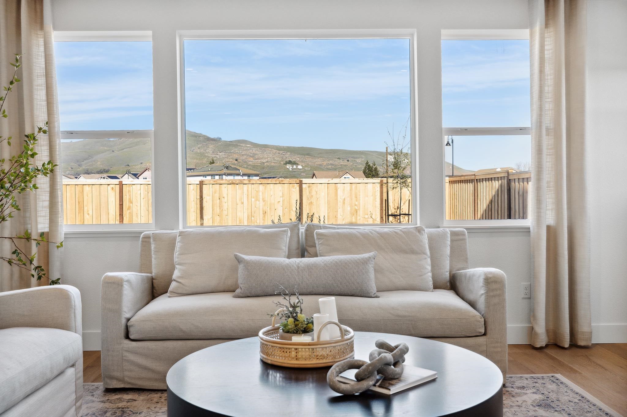 1516 Millennium Way Fairfield, CA 94533 - Photo 22 of 57 a living room with furniture and a large window