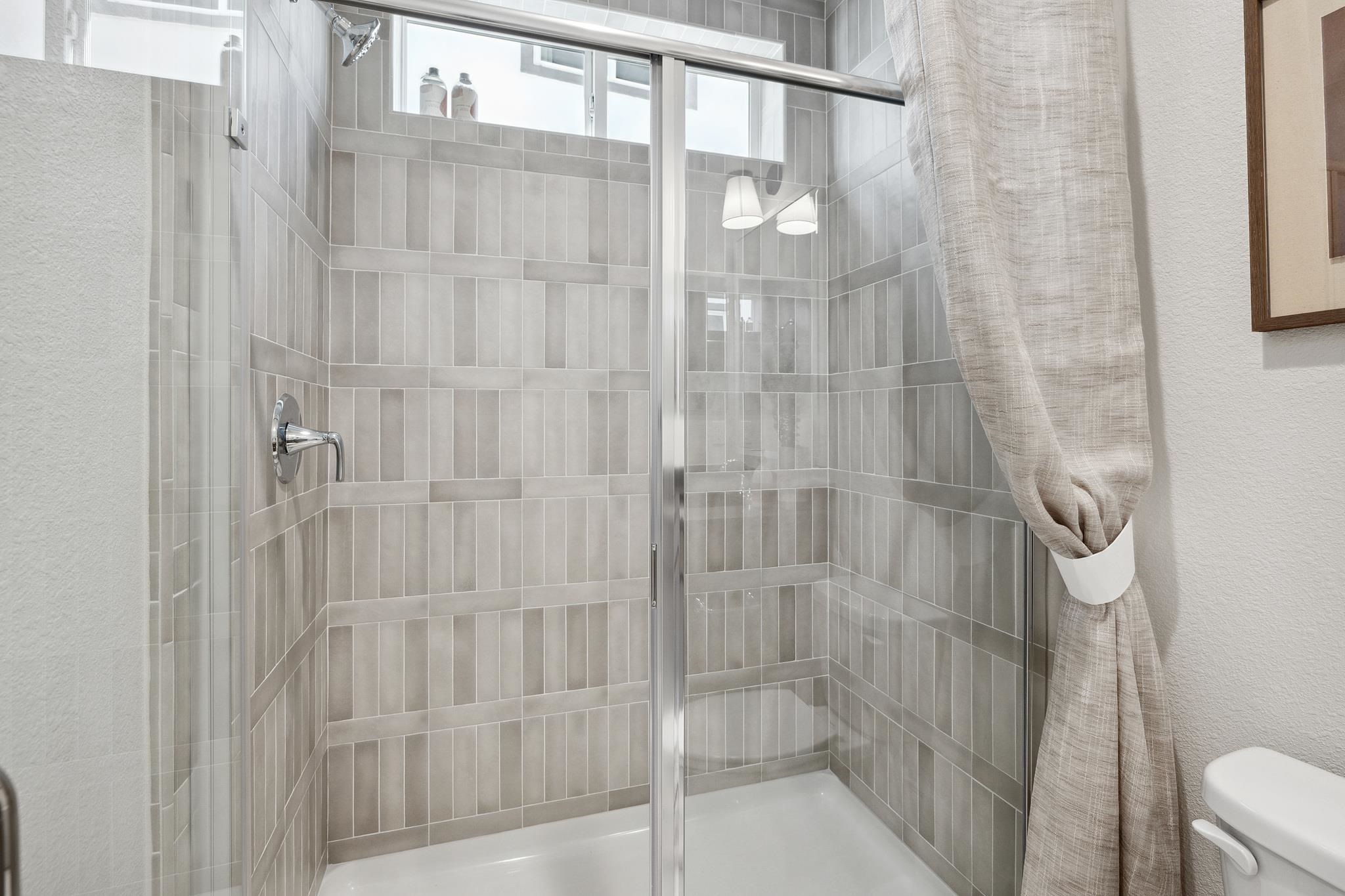 1516 Millennium Way Fairfield, CA 94533 - Photo 26 of 57 a bathroom with a shower and toilet