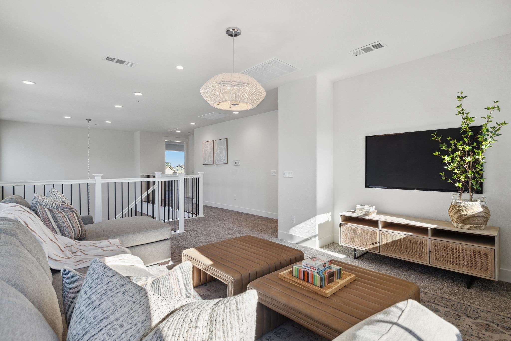 1516 Millennium Way Fairfield, CA 94533 - Photo 31 of 57 a living room with furniture kitchen view and a potted plant