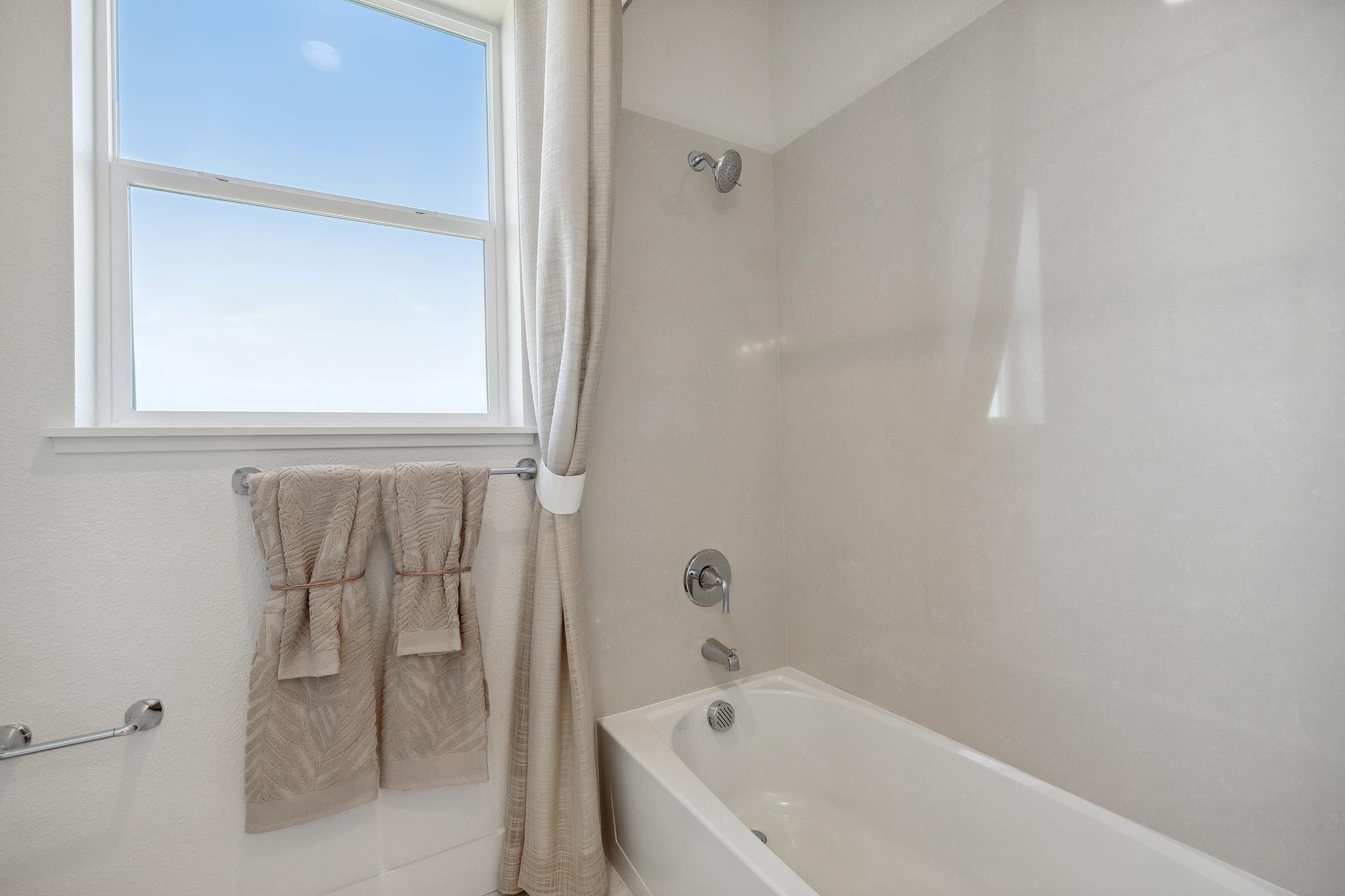 1516 Millennium Way Fairfield, CA 94533 - Photo 43 of 57 a bathroom with a bathtub and a sink