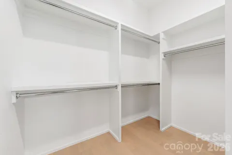 a view of an empty walk in closet