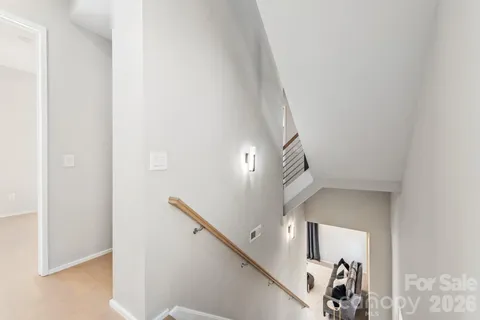 a view of a livingroom with stairs